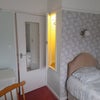 Photo 2: Has hanging space and mirror