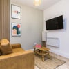 Photo 2: Living/kitchen area