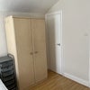 Photo 4: Wardrobe & small storage space