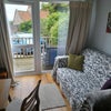 Photo 3: Living area looking out to the balcony