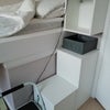 Photo 4: Bed and additional storage