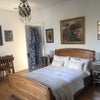 Photo 2: Double sleigh bed towards door to landing