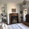 Photo 3: Double sleigh bed w door to kitchen