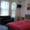 Photo 9: Room 3- Sofa is no longer in the room