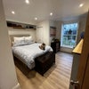 Photo 6: Double bedroom with built in wardrobes - cat not included
