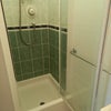 Photo 5: Shower works very well. Always hot water