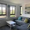 Photo 6: Living area (TV and double sofa bed)