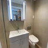 Photo 6: Sensor touch light on mirrored cabinet 
