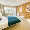 Photo 5: Large modern room overlooking the private garden