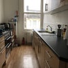Photo 2: Shared kitchen with new equipment and ample cupboard space 