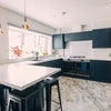 Photo 8: Communal Kitchen and Living Area