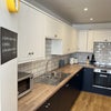 Photo 6: Modern Kitchen with 2 cupboards each 
