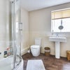 Photo 6: Shared bathroom with shower. 
