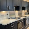 Photo 2: Kitchen / dining area 