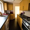 Photo 3: Fully-stocked shared Kichen