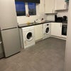 Photo 7: Shared spacious kitchen with dryer and washing machine 