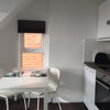 Photo 2: kitchen/dining area