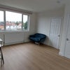 Photo 2: With the sofa in this position you can get your fix of winter sunlight