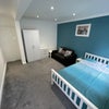 Photo 2: Bedroom With Double Bed and Sofa