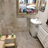 Photo 2: Downstairs wet room which has a fold away bathtub which has never been used.