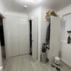Photo 5: Downstairs toilet/laundry area