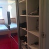 Photo 2: Floor to ceiling wardrobe in your room, half is behind the mirrored door