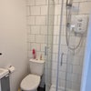 Photo 5: Shower and toilet 