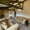 Photo 6: Living room with exposed beams and brickwork