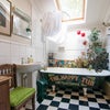 Photo 3: Bathroom - complete with a very unique roll-top bathtub and electric shower