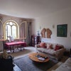 Photo 6: Shared lounge - complete with furniture and TV. Also has a log burner for the chilly winters
