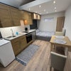 Photo 2: Main room with kitchen