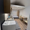 Photo 2: Main room with kitchen