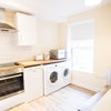 Photo 9: Communal Kitchen, dining and utility area