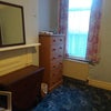 Photo 2: Dbl bedroom:single bed;2drawers,expandable table;fridge/freezer