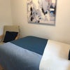 Photo 2: Smaller Sized Double Bedroom with armchair and TV