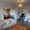 Photo 3: Living room with sliding doors into dining room