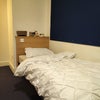 Photo 1: The single bed