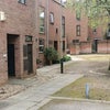 Photo 8: The ground floor flat is the door on the left