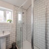 Photo 4: Shared shower bathroom