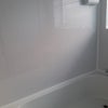 Photo 2: new bath with spalshwall surrounding it