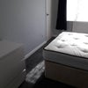 Photo 4: double room showing built in wardrobe and chest of drawers