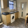 Photo 9: communal kitchen