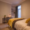 Photo 4: Bedroom 2, ground floor. Fully furnished, private en-suite, double doors directly to the garden