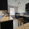 Photo 2: kitchen with integrated appliances and corian worktops