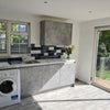 Photo 4: large kitchen with washing machine and separate utility