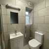 Photo 4: Bathroom (Both bathrooms in both rooms are the same layout) 