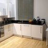 Photo 2: Kitchen/Living Space
