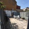 Photo 5: Garden with sun shine, table, chairs, washing line, pull up bar :)