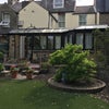 Photo 2: Back garden and rear of house