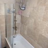 Photo 9: Bathroom has bath and shower